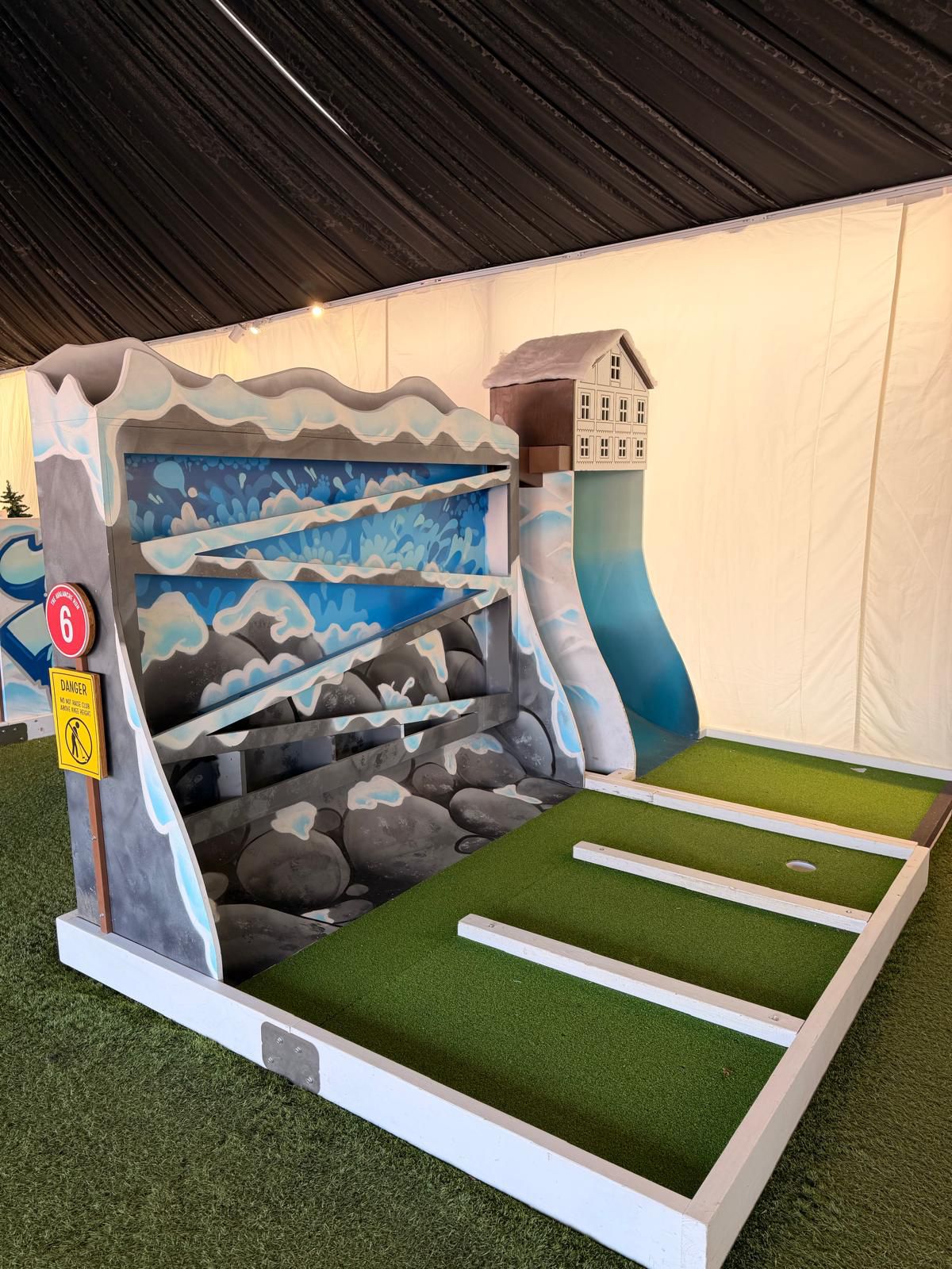 Snow fort obstacle and putting lane