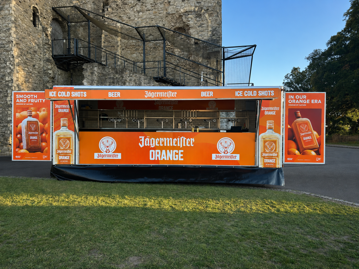Jägermeister Orange-branded mobile bar trailer at Rochester Castle
