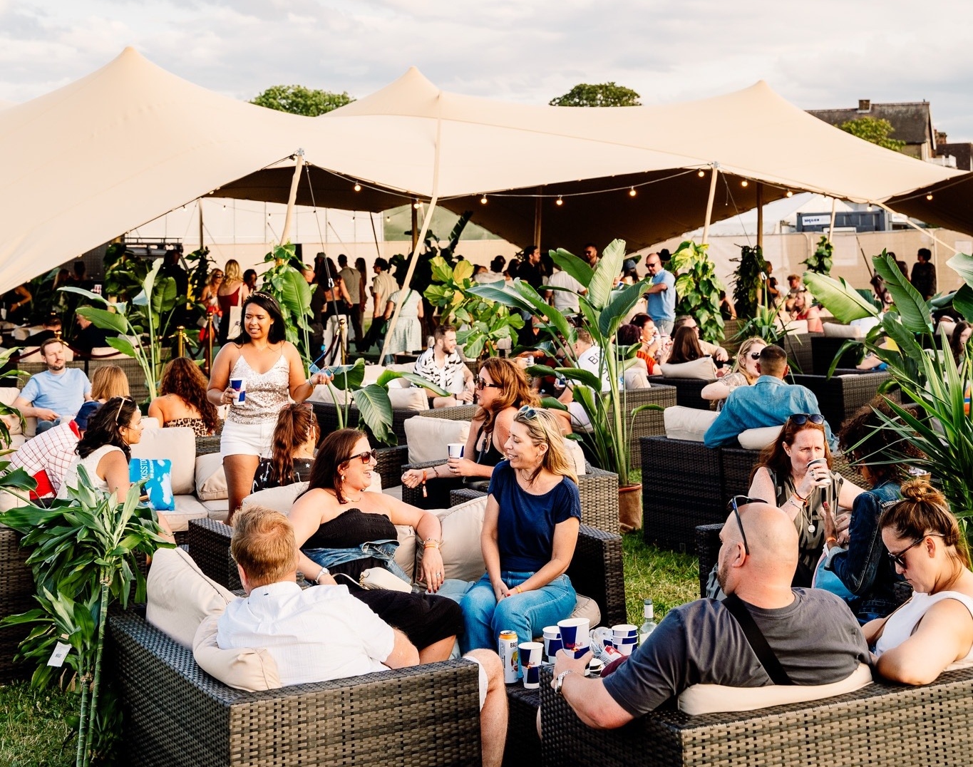 Guests in a festival hospitality space